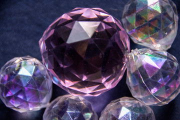 Group, set of geometric shapes, Platonic body, polyhedra, polygonal objects of metals and glass, gold, silver, bronze and stone