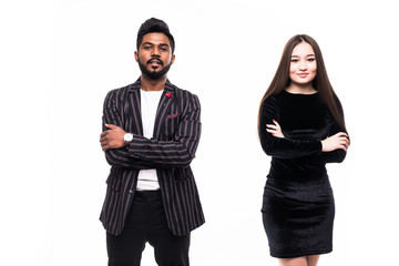 Asian couple in business suits standing together with arms crossed on white background