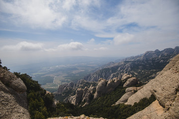 Fototapeta premium Aerial view of Montserrat mountains in a beautiful summer day, Catalonia, Spain 