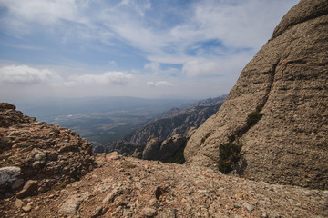 Aerial view of Montserrat mountains in a beautiful summer day, Catalonia, Spain 