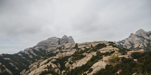 Aerial view of Montserrat mountains in a beautiful summer day, Catalonia, Spain 