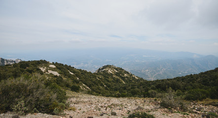 Fototapeta na wymiar Aerial view of Montserrat mountains in a beautiful summer day, Catalonia, Spain 