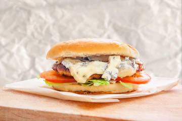 fresh flavored burger with juicy cutlet and blue cheese