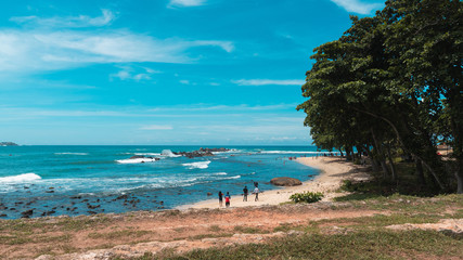 view of a beach full of people in Galle Fort