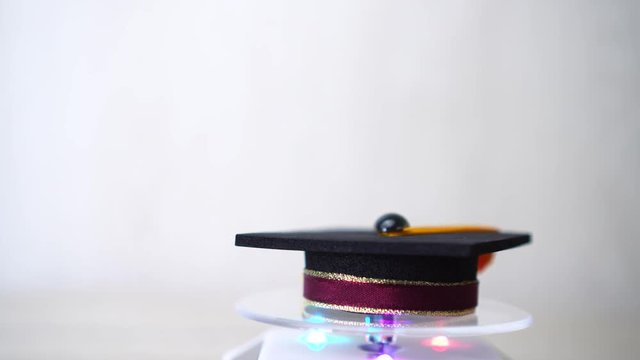 swivel of colored pencils in Spinning pencil brown box case on gray background. Black to school and writing for education. 4k
