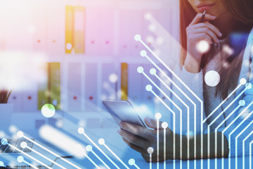 Woman with phone in office, technology
