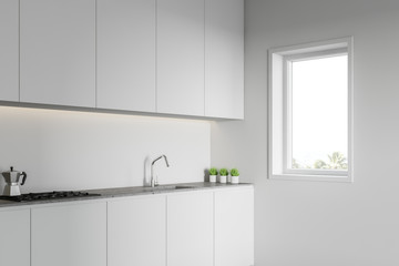 Loft white kitchen with countertops