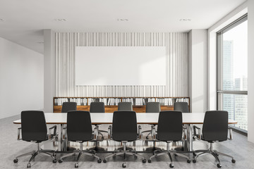 White wooden office meeting room with poster