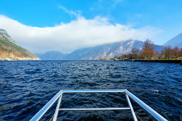 Mountain lake Traunsee with wave and clouds in Austria, Salzkammergut region.