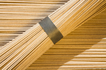 Dried buckwheat soba noodles background, top view. Flat lay, overhead