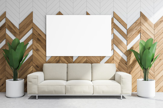 White and wooden lounge area, couch and poster