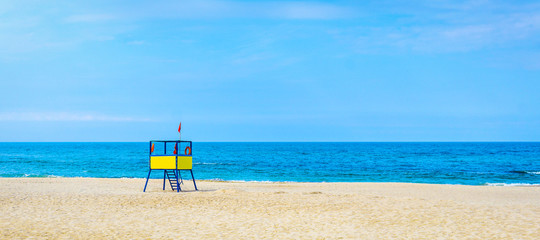 lifeguard tower at the beach.  background for summer postcard from vacation