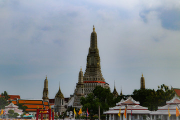 Bangkok, Thailand - May 18, 2019: Wat Arun, locally known as Wat Chaeng, is situated on the west (Thonburi) bank of the Chao Phraya River. It is easily one of the most stunning temples in Bangkok