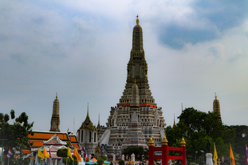 Bangkok, Thailand - May 18, 2019: Wat Arun, locally known as Wat Chaeng, is situated on the west (Thonburi) bank of the Chao Phraya River. It is easily one of the most stunning temples in Bangkok