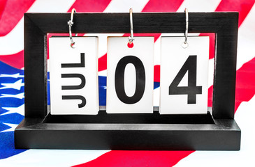 Date of 4th july on american flag.