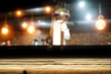 Desk of free space and blurred bar background. 