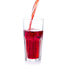 Cherry juice in a glass on white background isolation