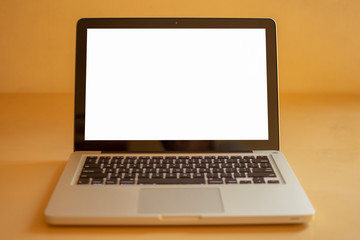 Laptop mockup on a yellow tablet with a white screen