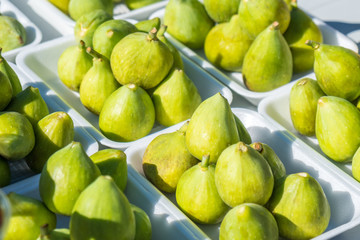 A background of fresh figs for sale at a market