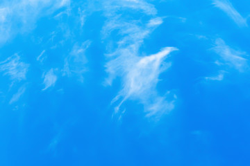 Cirrus clouds on a blue spring sky.