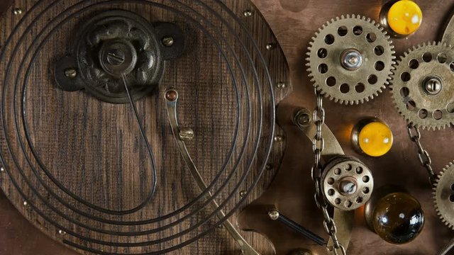 Steampunk, the pendulum beats off seconds, part of the time machine device with rotating gears, like a clockwork