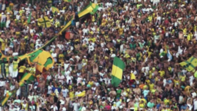 Blurred Crowd Of People, Supporters And Fans In A Stadium.