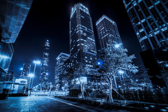 Fototapeta Road City Nightscape Architecture and Fuzzy Car Lights..