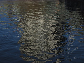 Reflection of a building in the river water