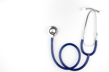 Blue stethoscope with shadow isolated on white background - Image