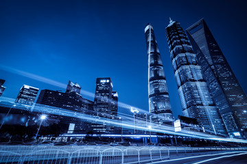 Fototapeta premium Road City Nightscape Architecture and Fuzzy Car Lights..