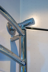 Elements of the bathroom interior-modern design, chrome details, parts of the shower cabin