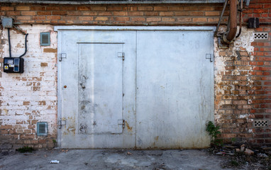 Fototapeta na wymiar old metal warehouse door, hangar, high resolution photo