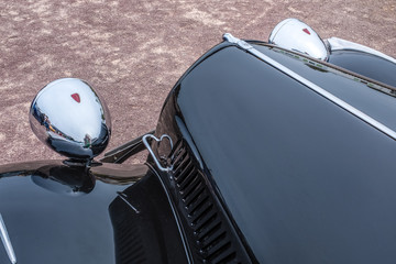 France-BernayNormandiy - MAY 01, 2019: Classic An oldtimer car close-up, black citroen traction avant évent promenadewth VVB club