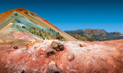 Most colorful volcanic mount Brennisteinsalda ( Sulphur Wave) in Landmannalaugar region at blue...