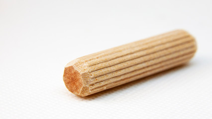 wooden dowel on white background