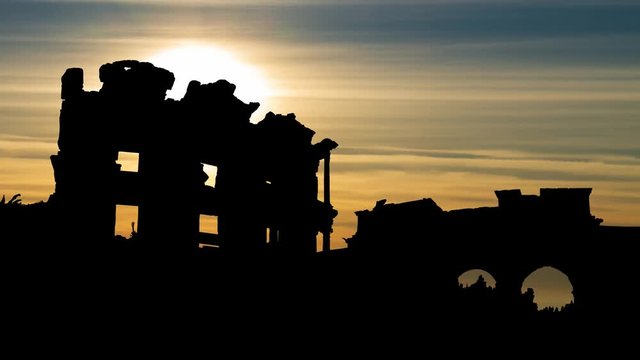 Ruins of Celsius Library in ancient city Ephesus, Time Lapse at Sunset of Silhouette, UNESCO World Heritage site, Turkey