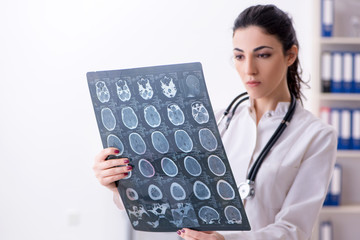 Young female doctor radiologist working in the clinic 