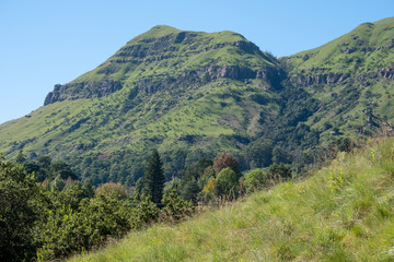 Naklejka premium Champagne Valley near Winterton, forming part of the central Drakensberg mountain range, Kwazulu Natal, South Africa.