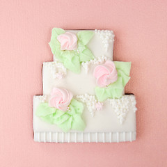 Gingerbread in the form of a three-tiered wedding cake