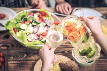 lunch at the table, pour summer drinks