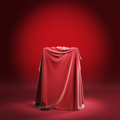 Empty podium or presentation pedestal with red silk cloth. 3d illustration