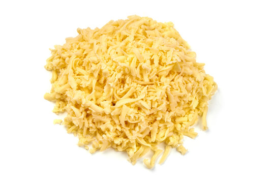 Grated cheddar cheese, close-up, isolated on white background