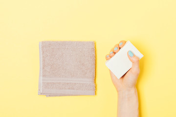 Woman's hand holding bar of soap