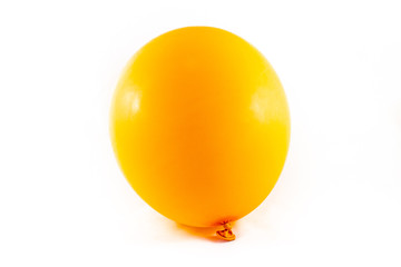 orange balloon full of air on white background