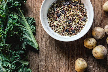 vegetable salad ingredients on wooden background