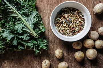 vegetable salad ingredients on wood background