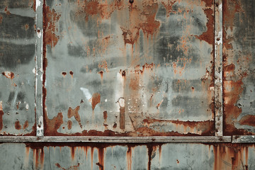Texture of rusty metal with peeling paint