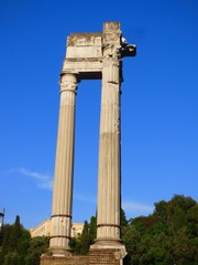 Fototapeta na wymiar Roman columns with a blue sky background