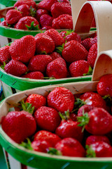 Fresh ripe sweet French strawberry in wooden basket.