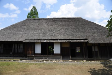 Fototapeta na wymiar Japanese traditional old folk house / Thatched roofs and inside the house.
